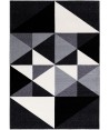 Tappeto grigio con effetto tridimensionale geometrico